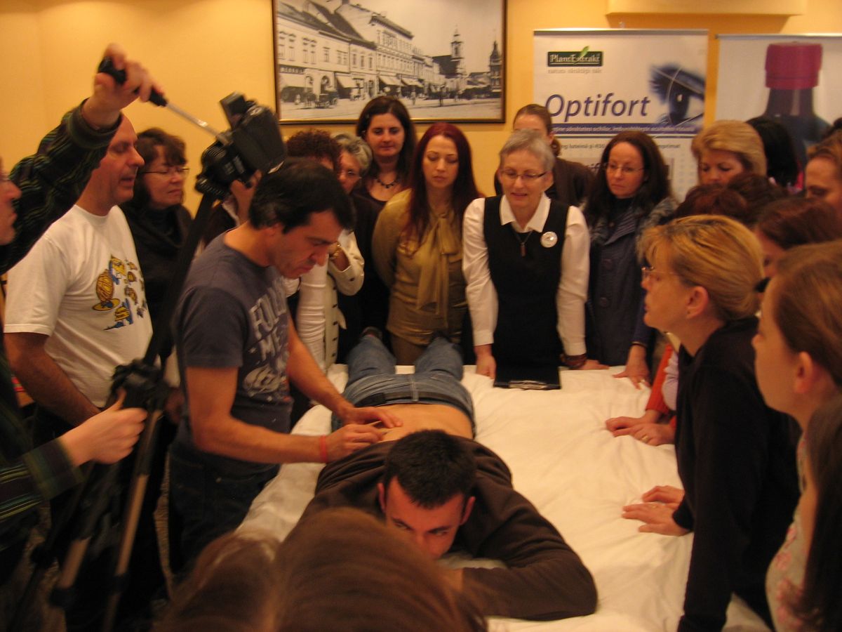Practical therapy demonstration during a BeeAlive Academy group course